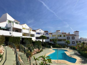Apartment with garden and communal pool